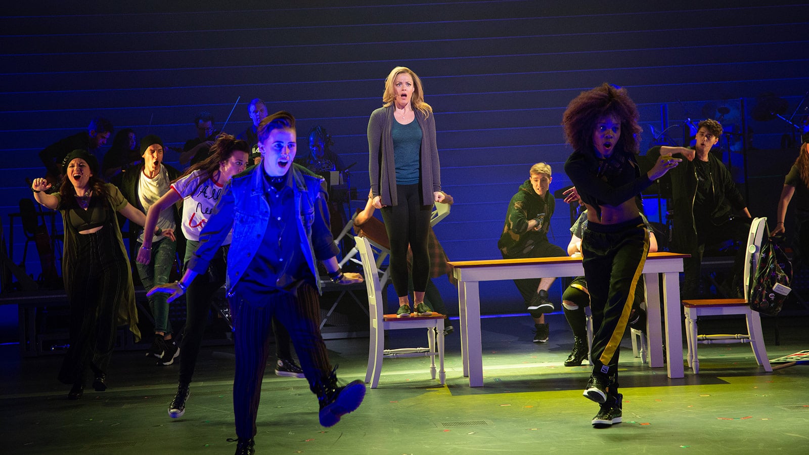 Elizabeth Stanley as Mary Jane Healy and The Chorus of American Repertory Theater's <em>Jagged Little Pill</em>