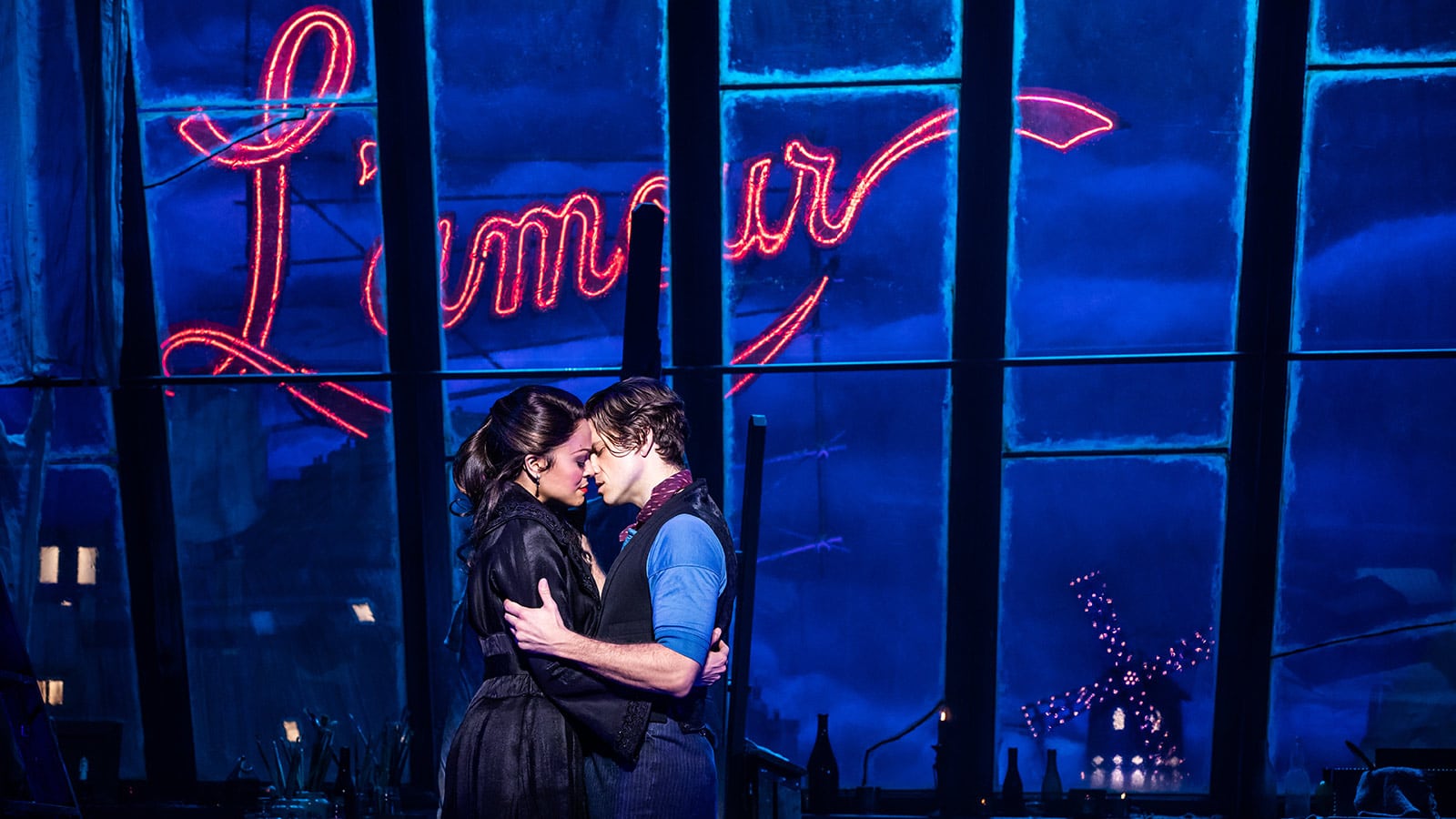 Karen Olivo as Satine and Aaron Tveit as Christian