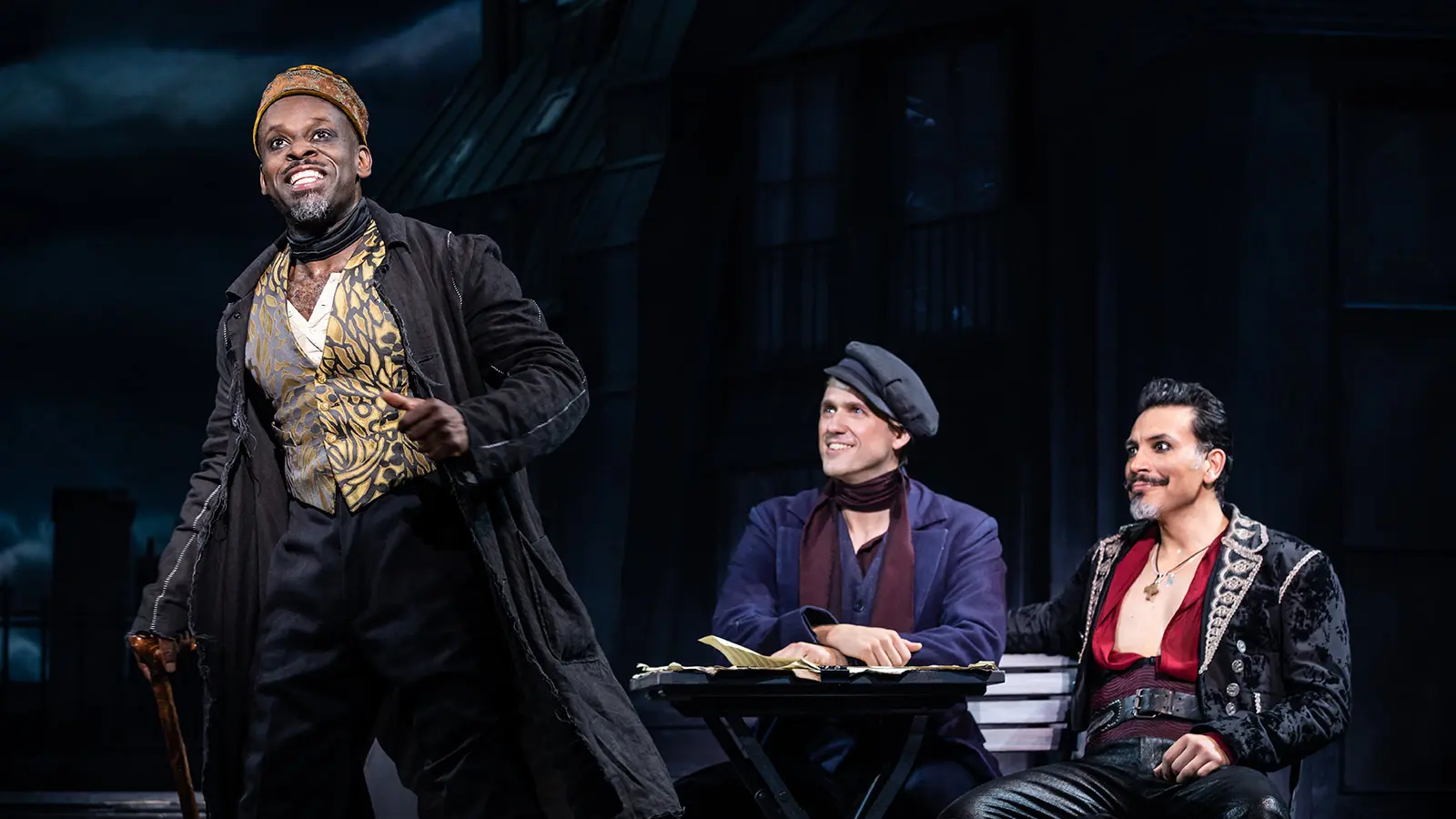 Sahr Ngaujah as Toulouse-Lautrec, Aaron Tveit as Christian and Ricky Rojas as Santiago